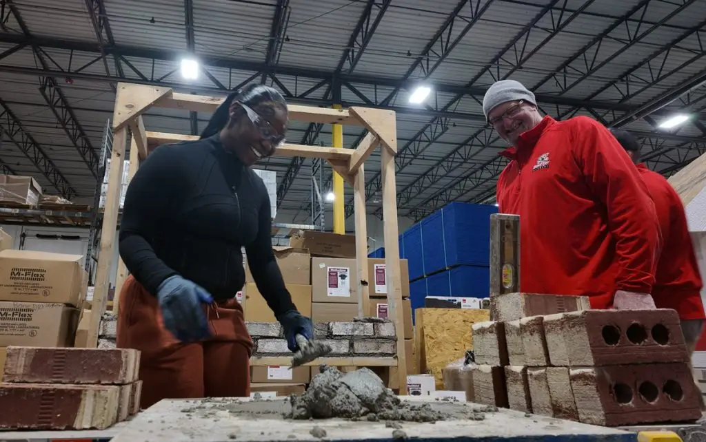 Young person practicing masonry with Bone Dry